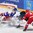 HELSINKI, FINLAND - JANUARY 5: Finland's Kasper Bjorkqvist #12 gets a shot off on Russia's Alexander Georgiev #30 with pressure from Damir Sharipzyanov #4 during gold medal game action at the 2016 IIHF World Junior Championship. (Photo by Matt Zambonin/HHOF-IIHF Images)

